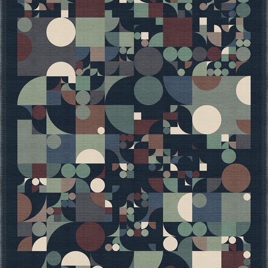 Teal and navy geometric rug for living room.