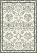 Green floral rug with damask pattern.