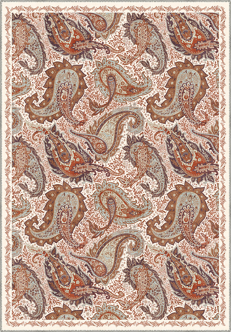 Brown paisley rug on a cream background.