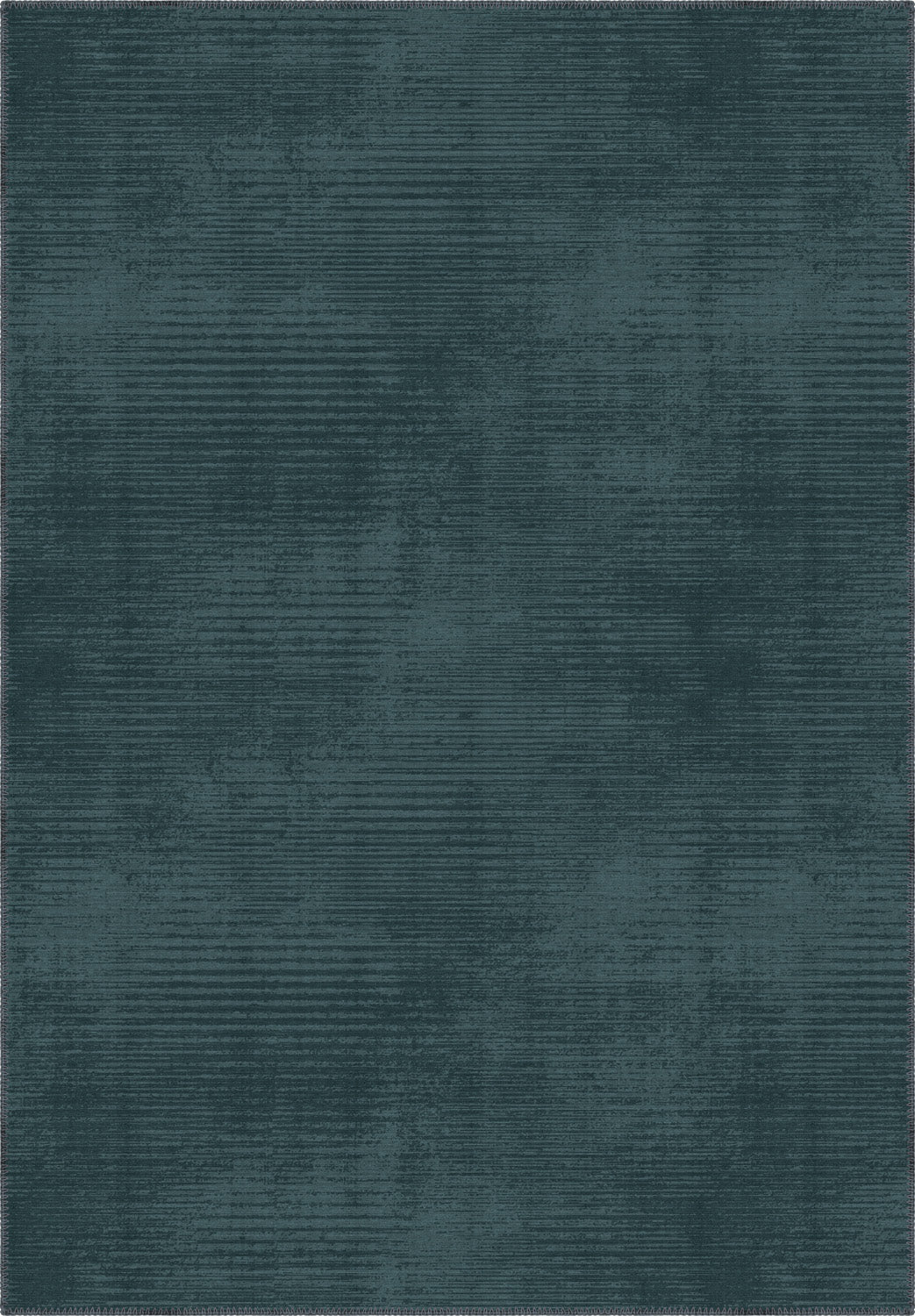 Teal rug with a subtle pattern on a plain background