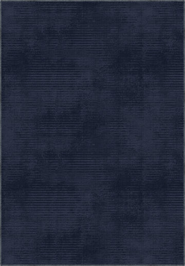 Navy blue rug with a subtle pattern in midnight blue tones.