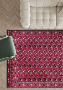Pink bokhara rug for living room.