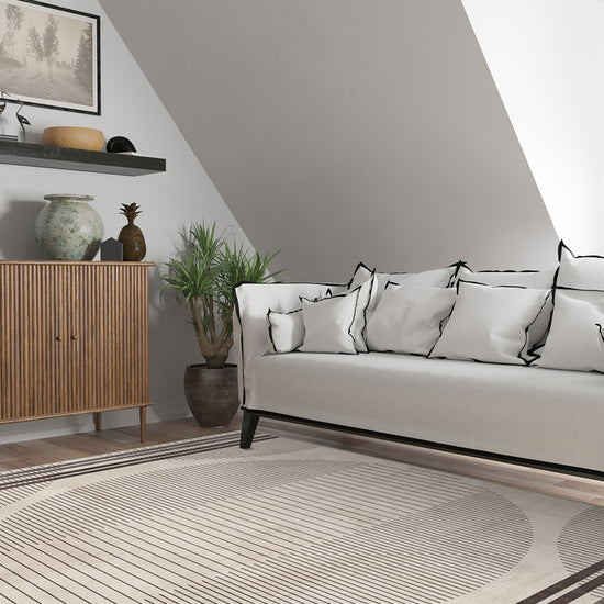 Cream geometric rug for living room.