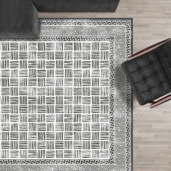 Black and white geometric rug for living room.
