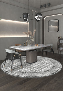 Black and white round rug for dining room.